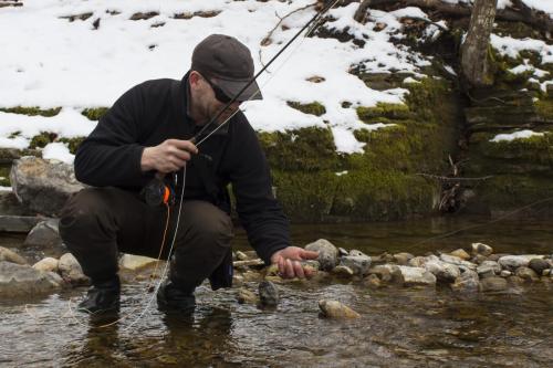 ice-fly-fishing-in-mountain-02